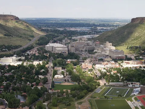 Golden from Lookout Mountain Road in July 2011: the town and the Colorado School of Mines campus between North and South Table Mountains, the plains beyond