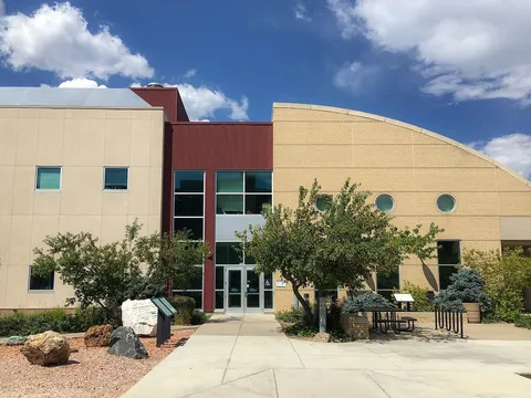 The entrance of the General Research Lab building on the Colorado School of Mines campus, home of the Mines Museum, with boulder specimens on the plaza in front