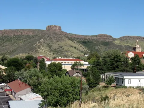 The flat top of South Table Mountain and its Castle Rock outcrop above the Colorado School of Mines campus