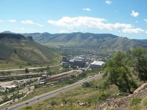 Looking west from the southern slopes of North Table Mountain: South Table Mountain on the left, the Coors brewery and Golden in the valley, and the foothills where Clear Creek Canyon opens